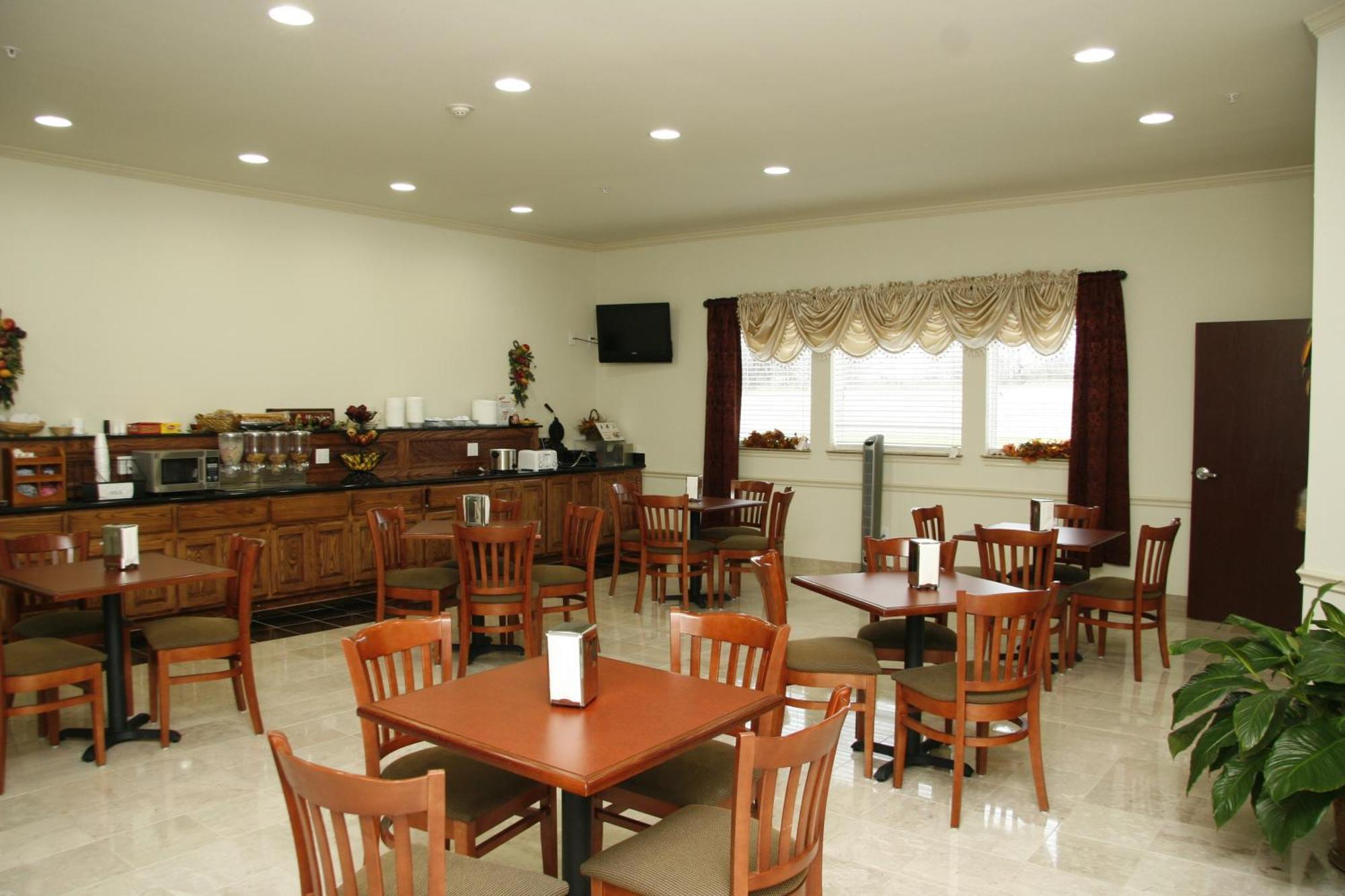 Budget Host Inn And Suites Cameron Room photo